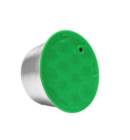 Capsule réutilisable Dolce Gusto avec couvercle vert en plastique résistant.